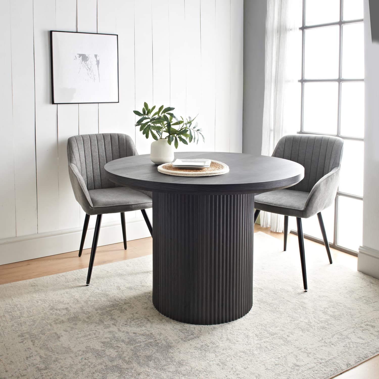 425885-ezra-black-dining-table-with-panelled-base-105cm
